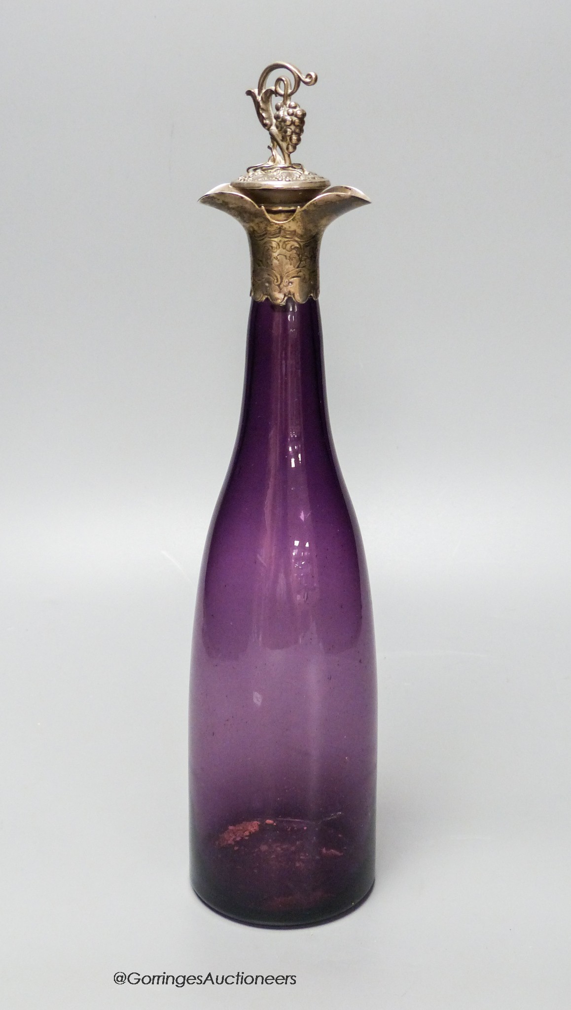 A Victorian silver mounted amethyst glass decanter, height 31cm